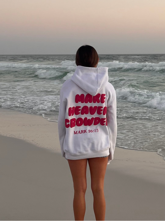 Girl wearing Make Heaven Crowded Classic Puff Print Hoodie- White and Pink- Mark 16:15